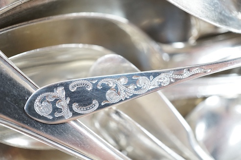 A quantity of assorted 18th century and later silver flatware various dates, makers and patterns, including table spoons, table forks, dessert forks teaspoons, butter knife etc. and an 800 teaspoon